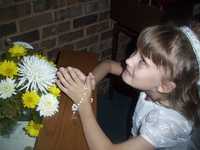 During the offeratory Nadia was one of the girls that brought up a basket of flowers.